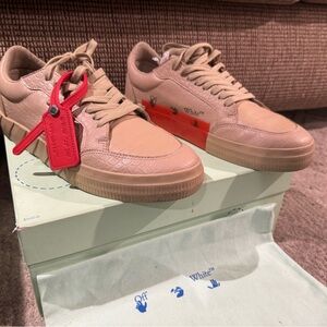 Off-White Sand Sneakers with Blue Accents